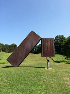 Storm King Art Centre Sculpture Park, artist with sculpture by Menashe Kadishman, USA